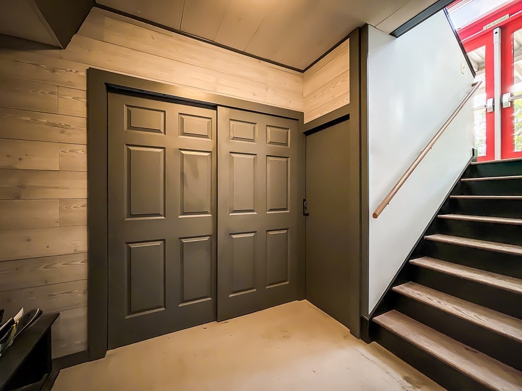 164 A Depot Road Hatfield, MA 01066 - Photo 20 of 40 a bedroom with a bed and wooden floor