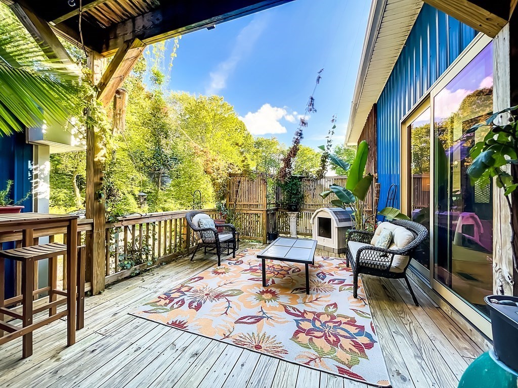 164 A Depot Road Hatfield, MA 01066 - Photo 36 of 40 a balcony with furniture and wooden floor
