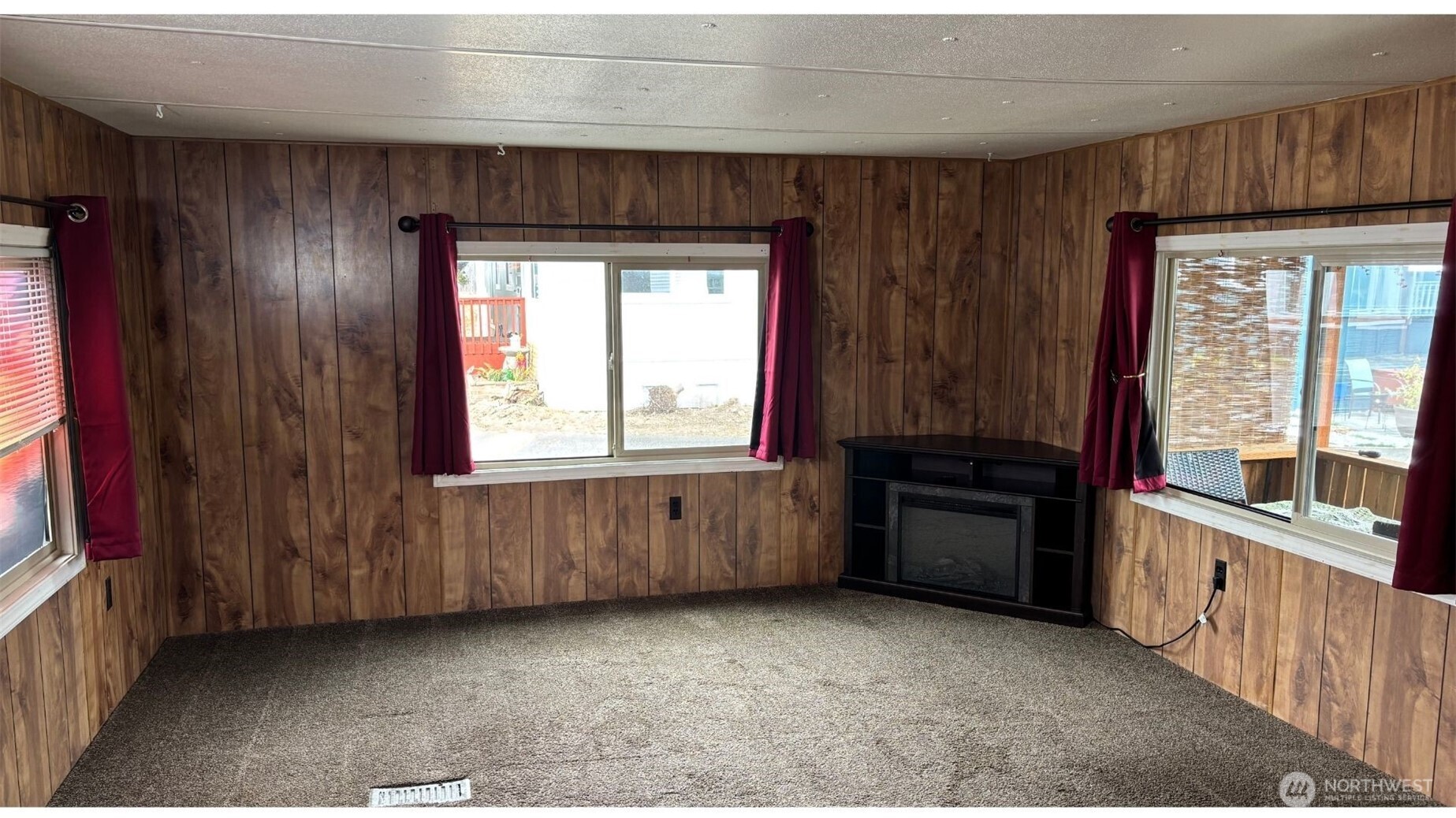 17103 Spanaway Loop Road South, Unit 22 Spanaway, WA 98387 - Photo 3 of 6 an empty room with windows