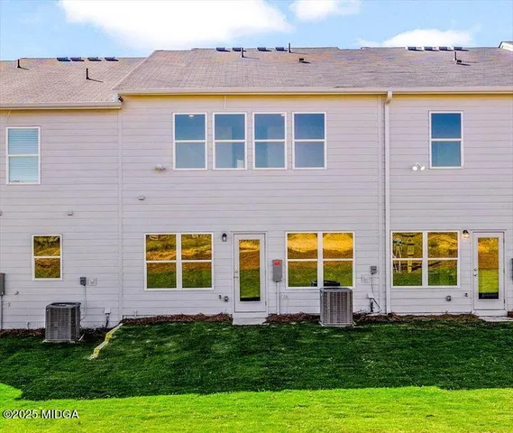 a view of building with yard