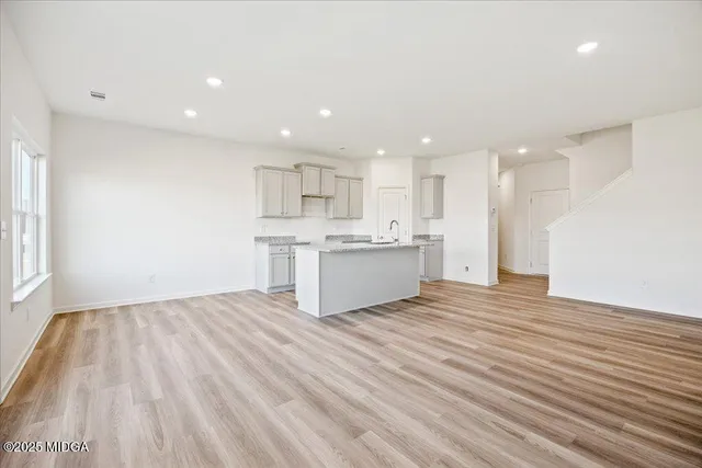 a view of kitchen with wooden floor