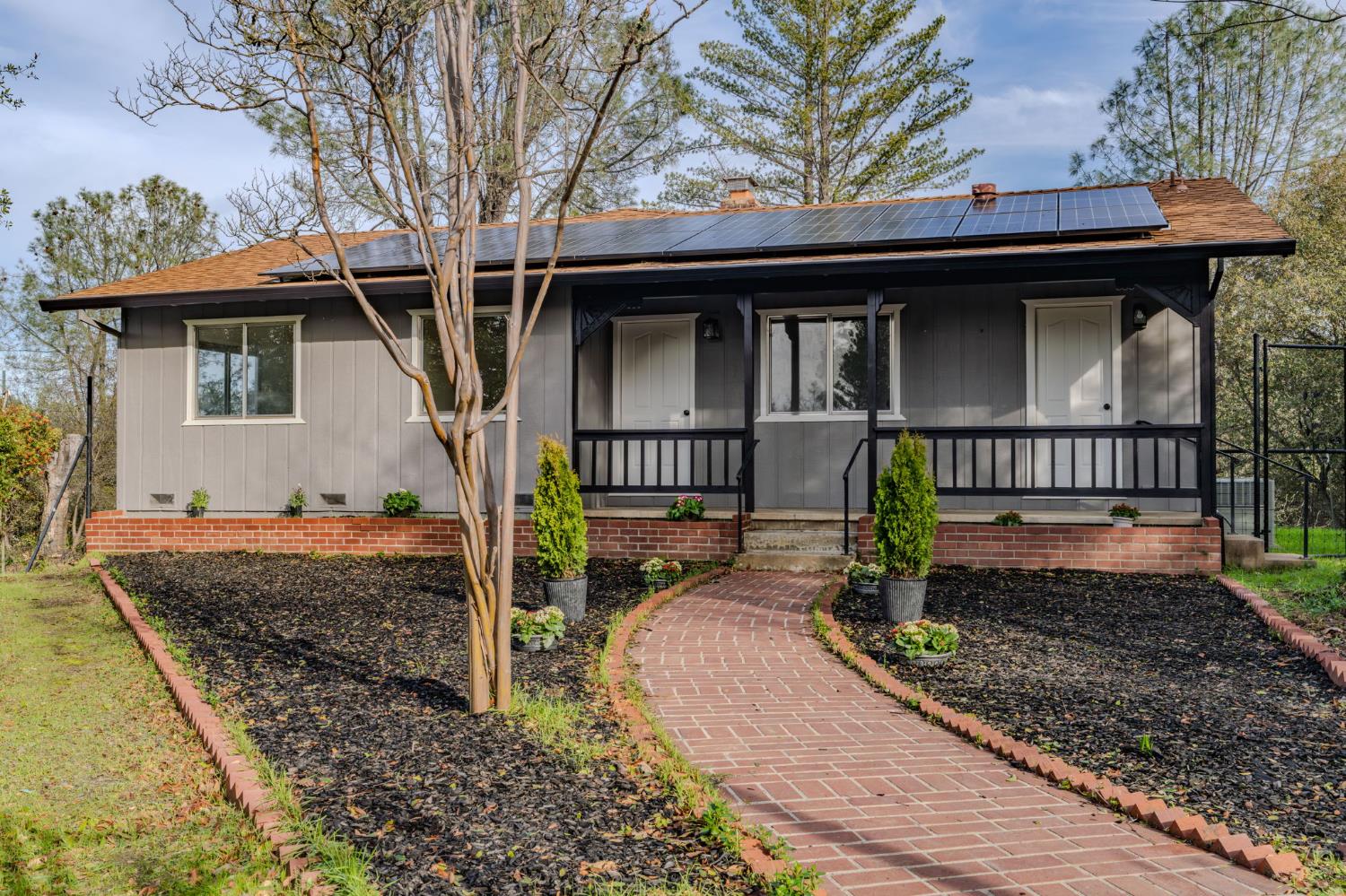 13171 Ridge Court Sutter Creek, CA 95685 - Photo 5 of 66 a front view of a house with garden