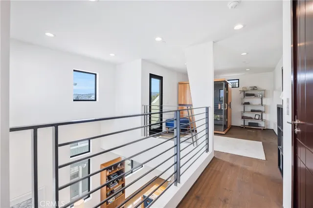 a living room with stainless steel appliances kitchen island granite countertop furniture and a kitchen view