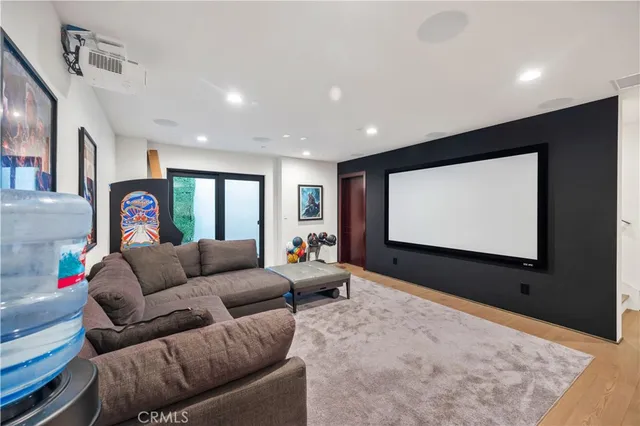 a spacious bedroom with a bed and a large window