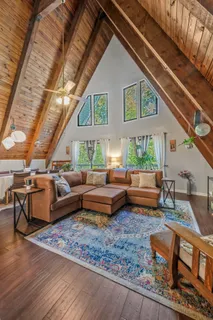 a outdoor space with patio lots of furniture and wooden floor