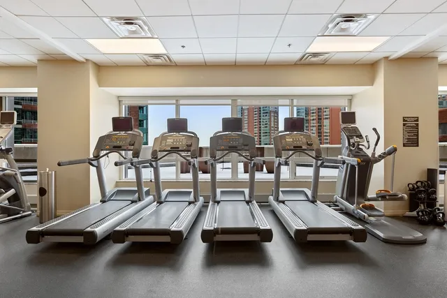 a gym room with gym equipment