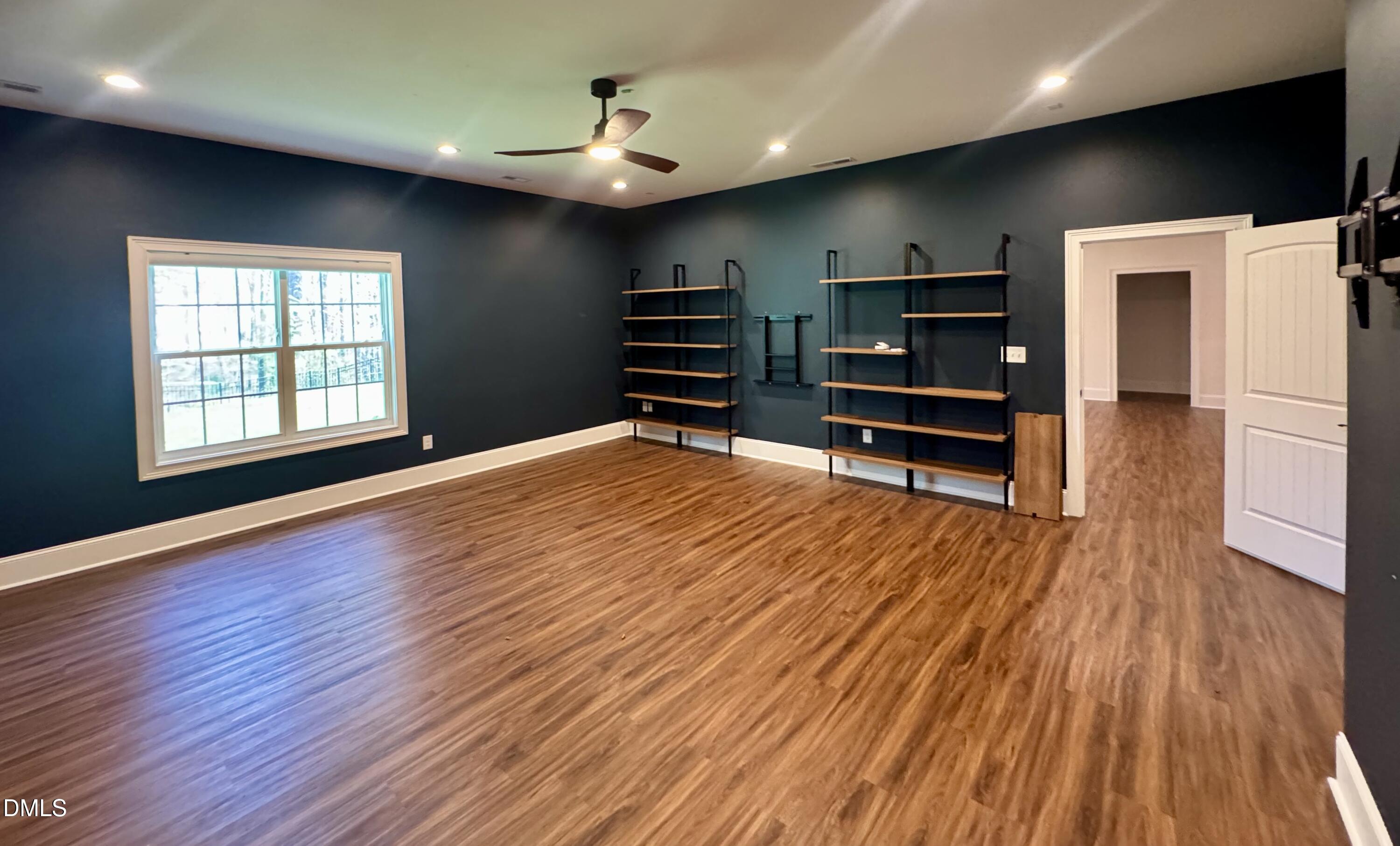 1329 Sandybrook Lane Wake Forest, NC 27587 - Photo 7 of 16 a view of a livingroom with furniture and wooden floor