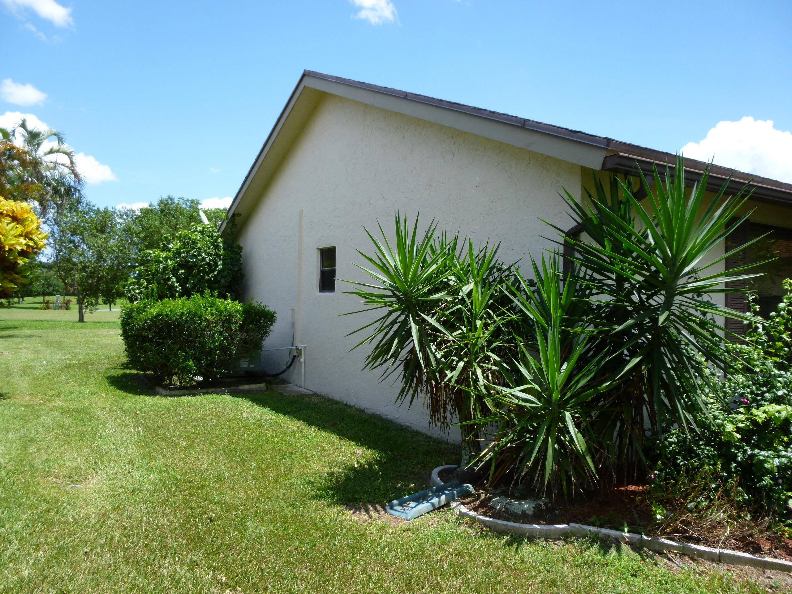 19522 Hampton Drive Boca Raton, FL 33434 - Photo 3 of 44 Northside from front