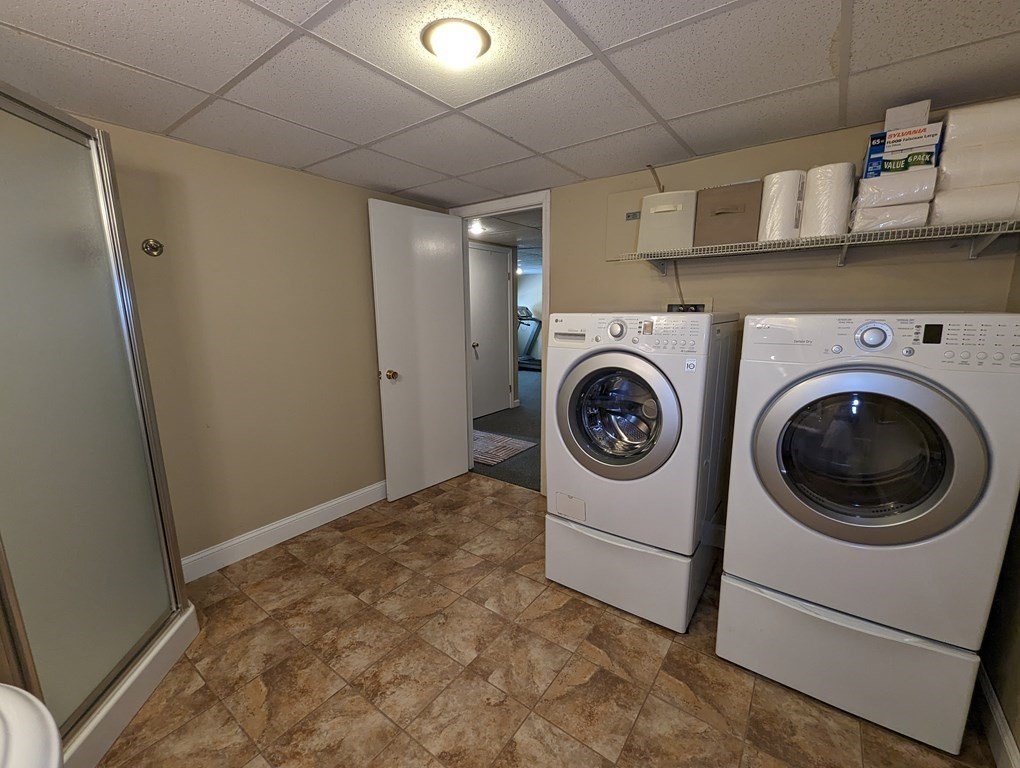 56 Colburn Road Charlton, MA 01507 - Photo 15 of 40 a utility room with dryer and washer
