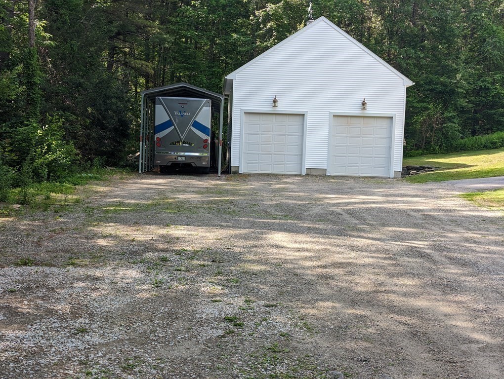 56 Colburn Road Charlton, MA 01507 - Photo 36 of 40 a view of a backyard of the house