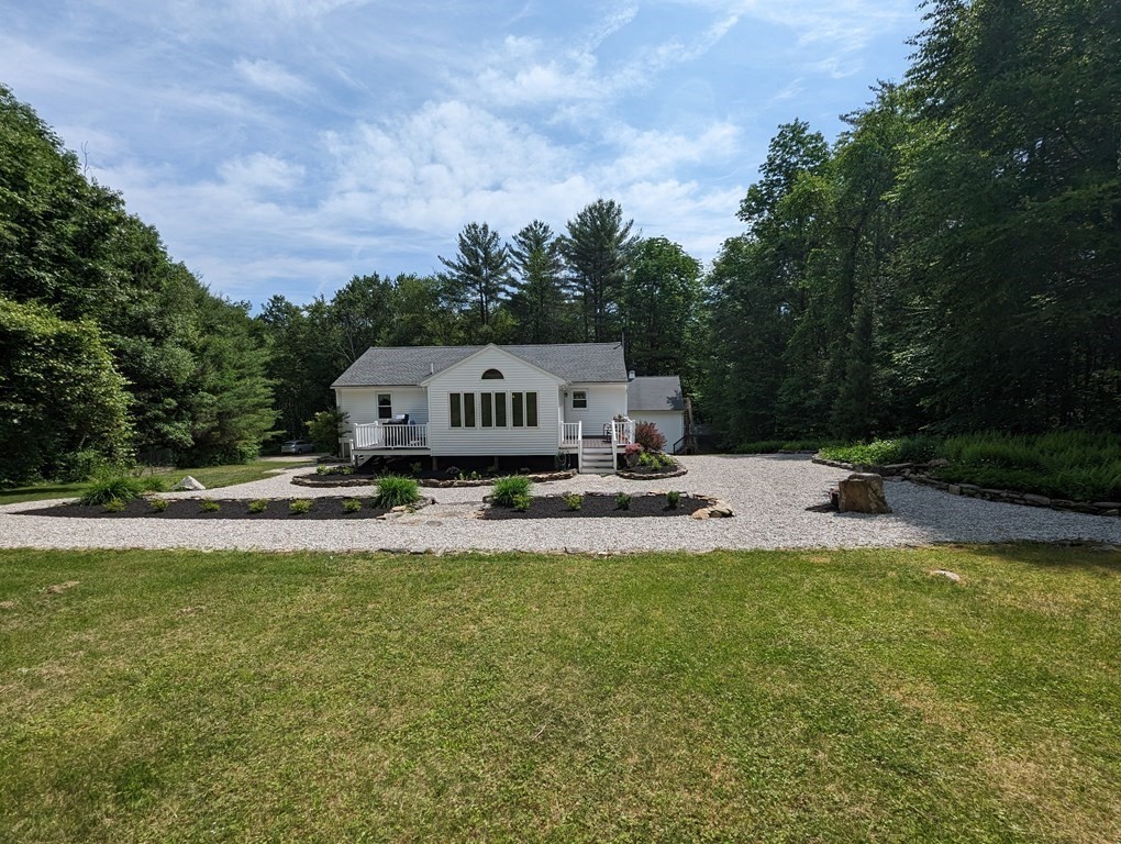 56 Colburn Road Charlton, MA 01507 - Photo 8 of 40 a view of a swimming pool with a patio