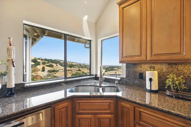 a bathroom with a toilet a sink and shower