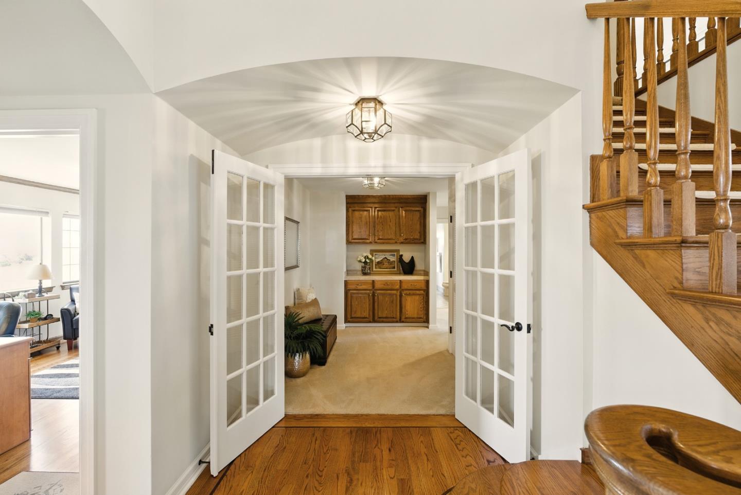 2525 Bridle Path Drive Gilroy, CA 95020 - Photo 29 of 85 a view of a hallway view with wooden floor and staircase