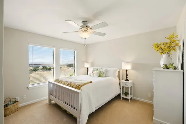 a view of swimming pool with outdoor seating and a yard