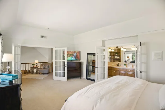 a view of a garden with a building in the background