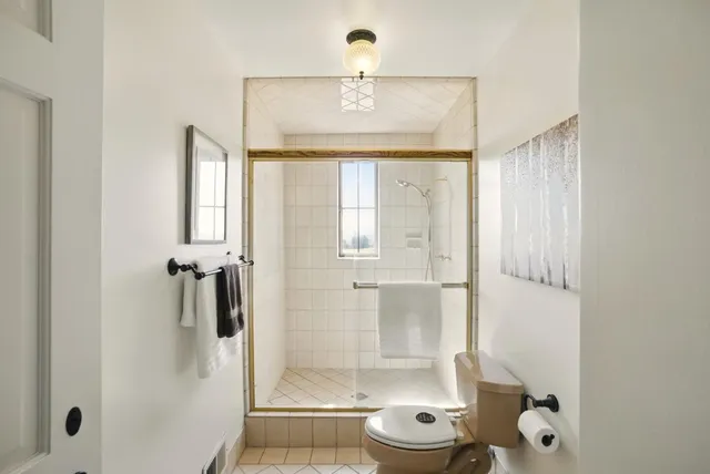 a view of a swimming pool and an outdoor space