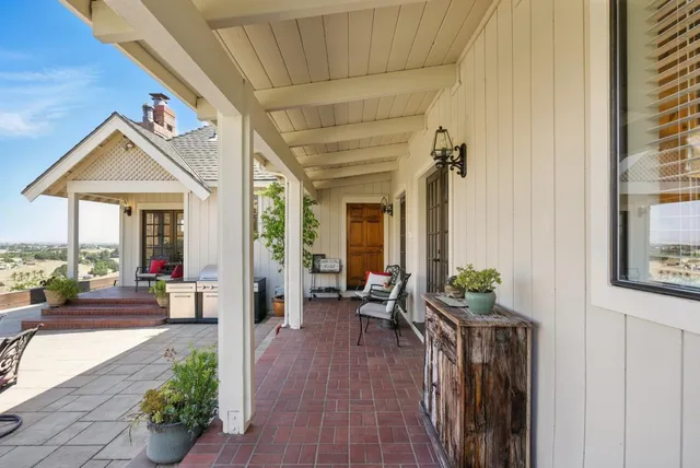 a front view of a house with a porch
