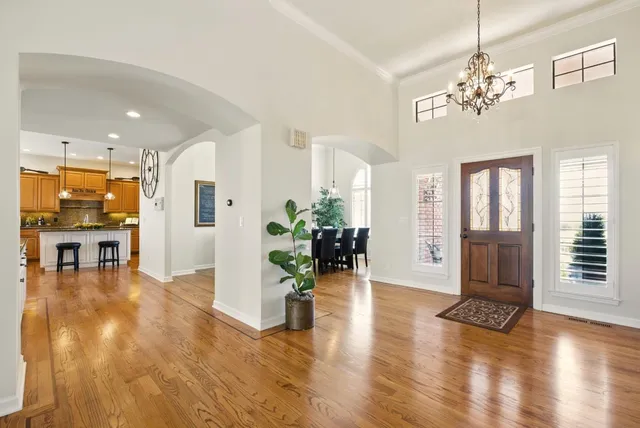 a living room with furniture and a swimming pool