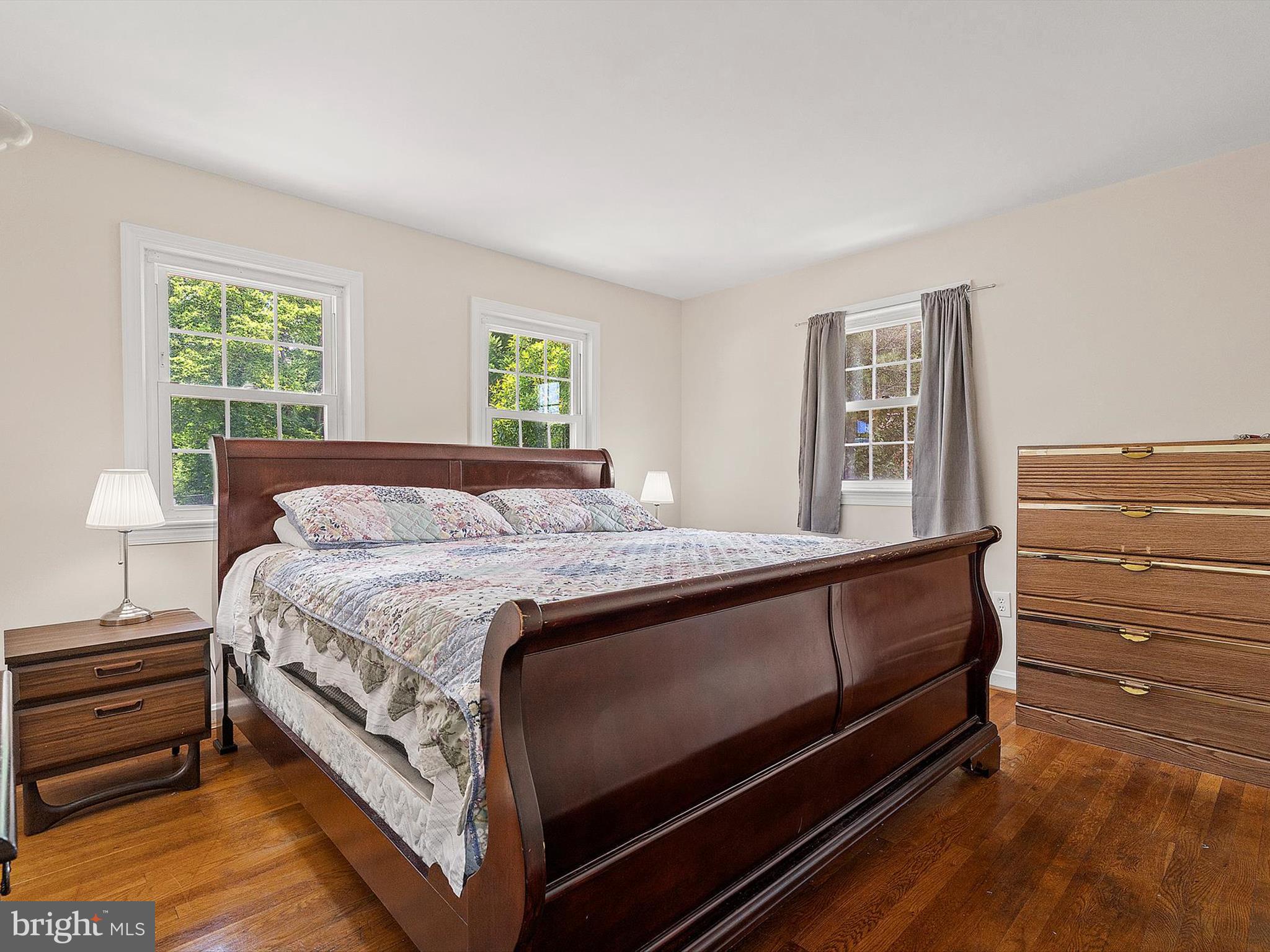 10525 Edgemont Drive Adelphi, MD 20783 - Photo 13 of 36 a bed sitting in a bedroom next to a window