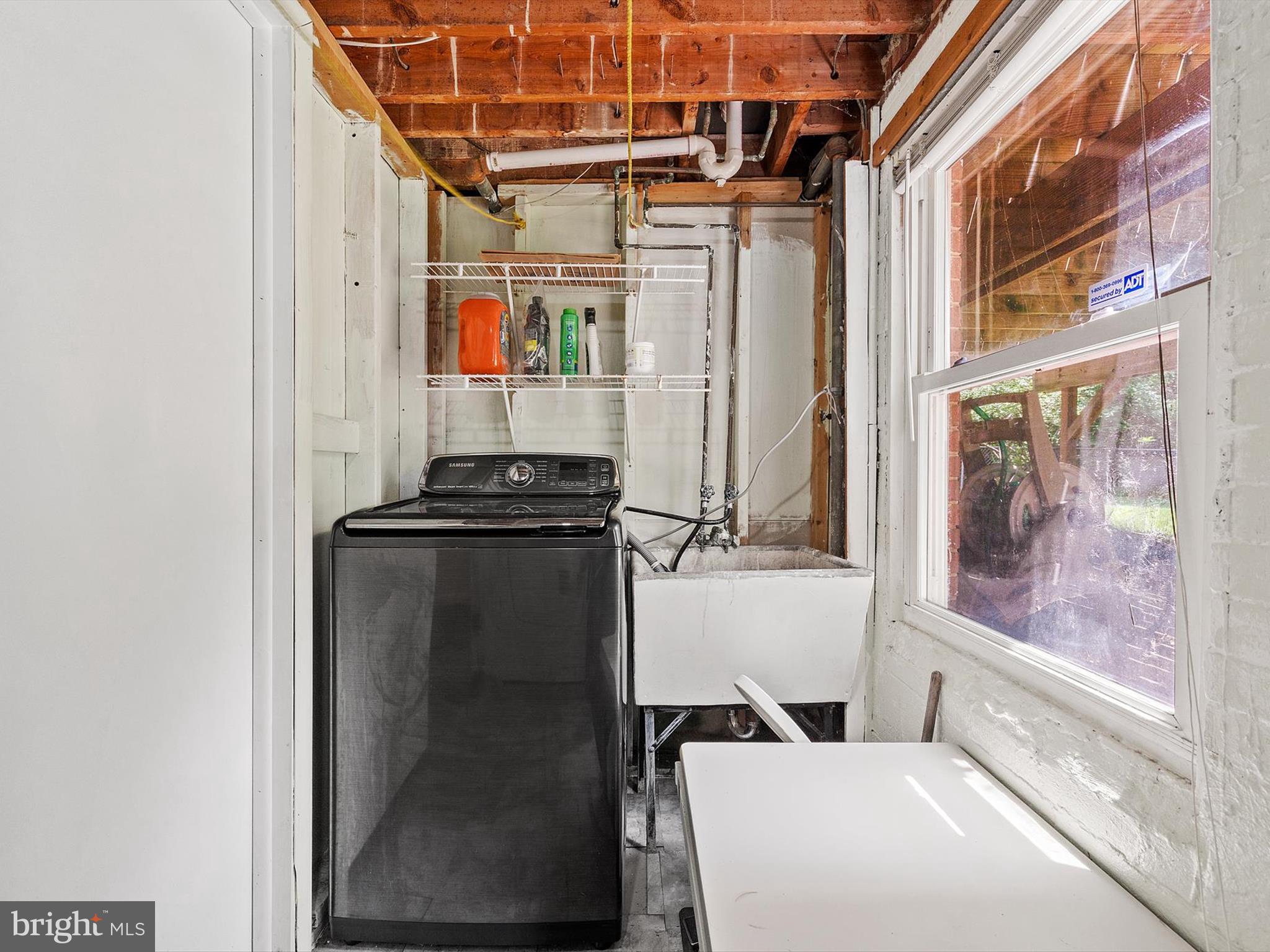 10525 Edgemont Drive Adelphi, MD 20783 - Photo 29 of 36 a bathroom with a sink a toilet and shower