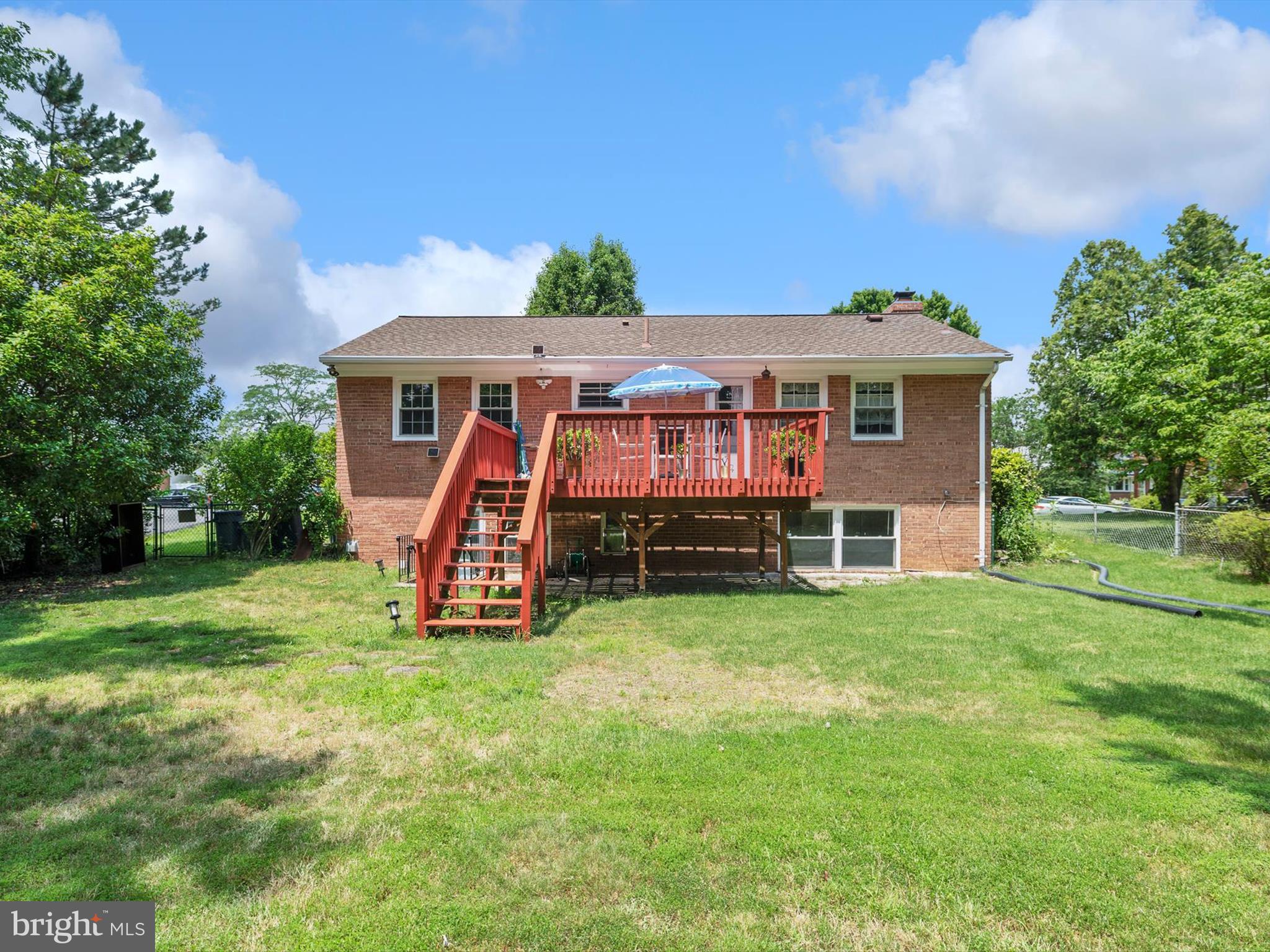 10525 Edgemont Drive Adelphi, MD 20783 - Photo 31 of 36 a view of a house with a backyard
