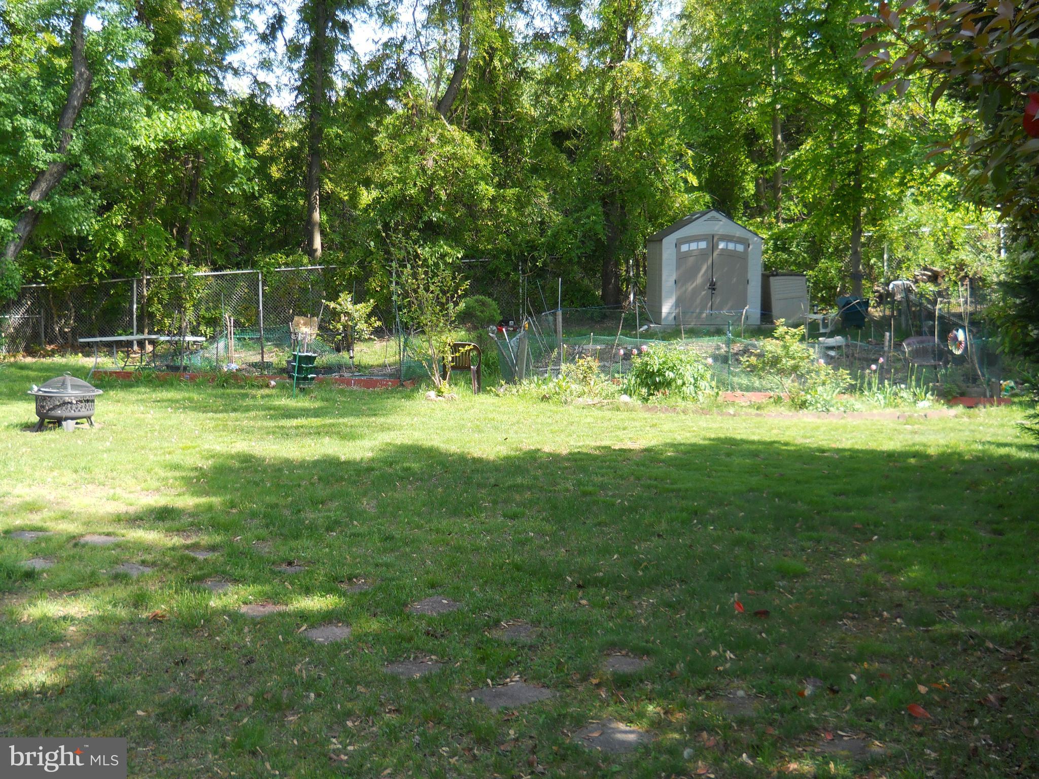 10525 Edgemont Drive Adelphi, MD 20783 - Photo 34 of 36 a view of a house with a yard