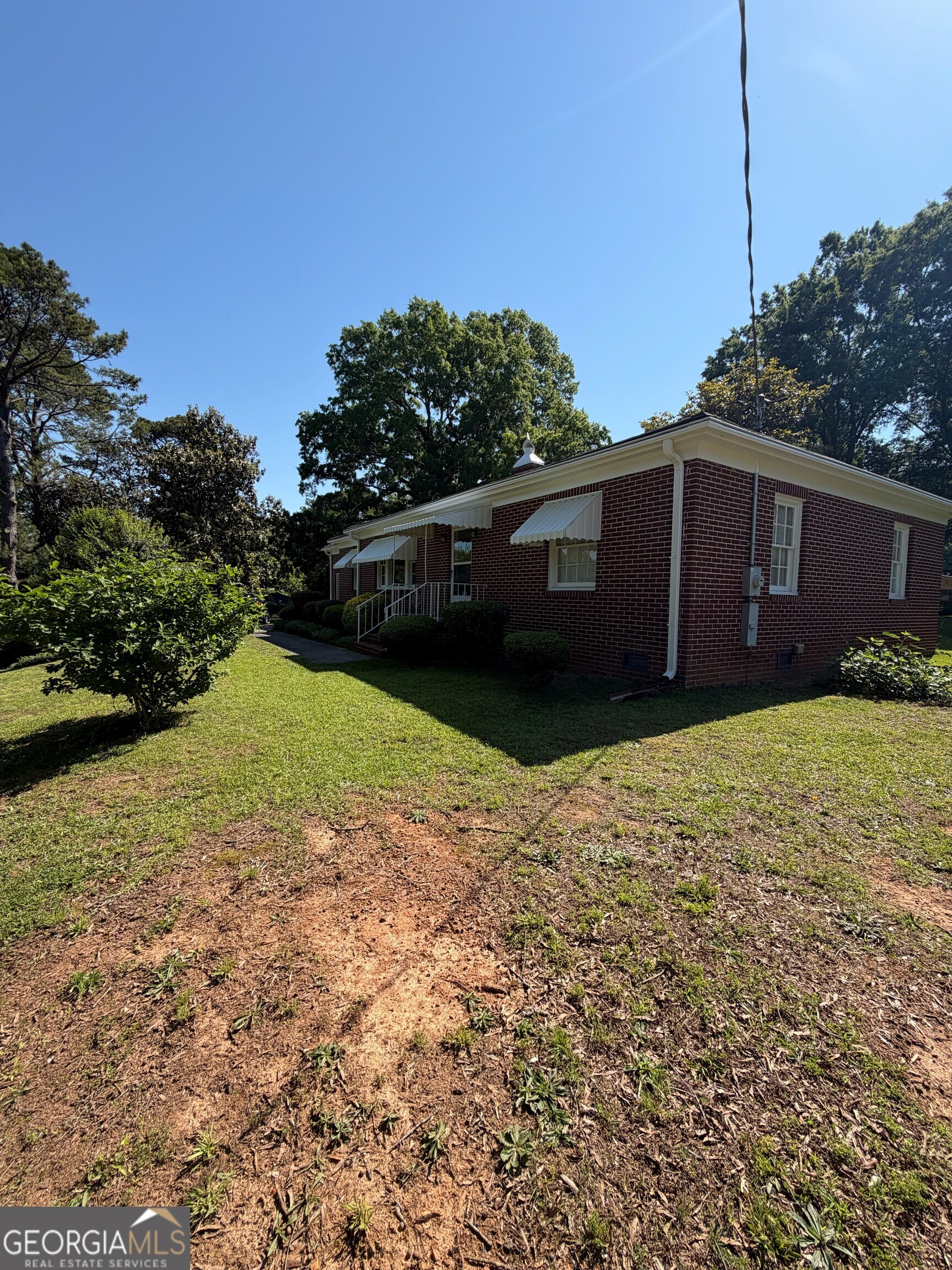 2619 Maple Road Southeast Rome, GA 30161 - Photo 20 of 31 a view of a house with a yard