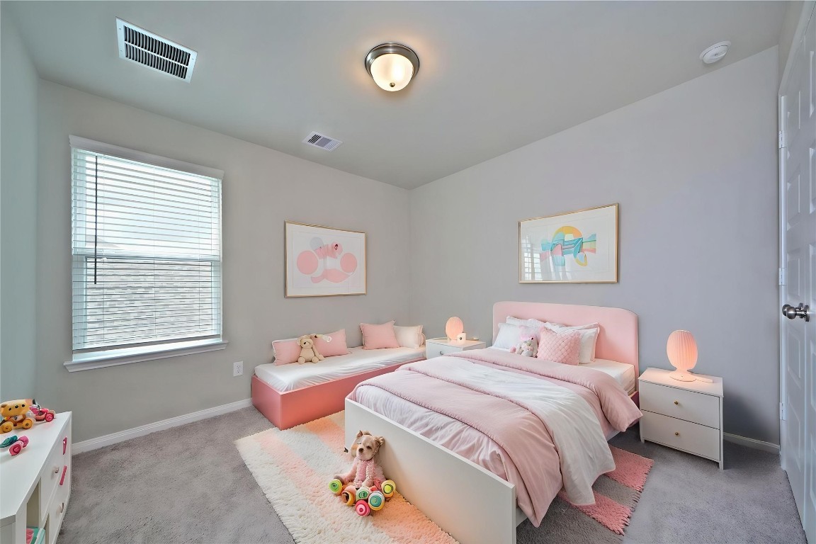1015 Modesto Drive Rosharon, TX 77583 - Photo 30 of 37 Another spacious guest bedroom with soft carpeting and neutral tones, ready for your personal touch! A cozy retreat that offers comfort and flexibility. *Virtually Staged*