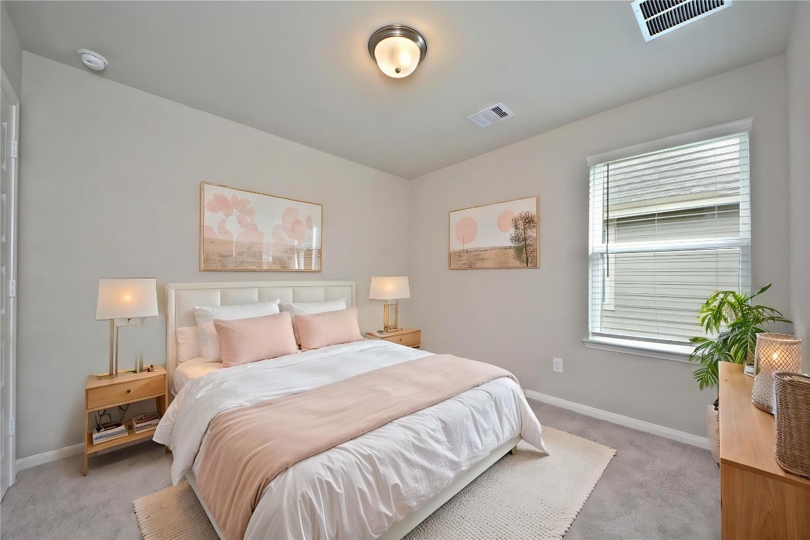 1015 Modesto Drive Rosharon, TX 77583 - Photo 31 of 37 Generously sized bedroom featuring ample natural light and a functional layout, perfect for growing households or visiting guests! Move in ready and waiting for you. *Virtually Staged*