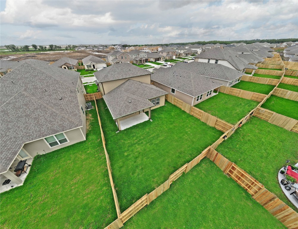 1015 Modesto Drive Rosharon, TX 77583 - Photo 34 of 37 Aerial view showcasing the beautifully planned community and surrounding homes with well maintained lots and inviting neighborhood feel! Enjoy the charm and convenience of living in a desirable location with easy access to everything you need.