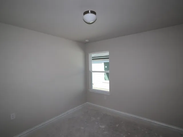 a view of empty room with window