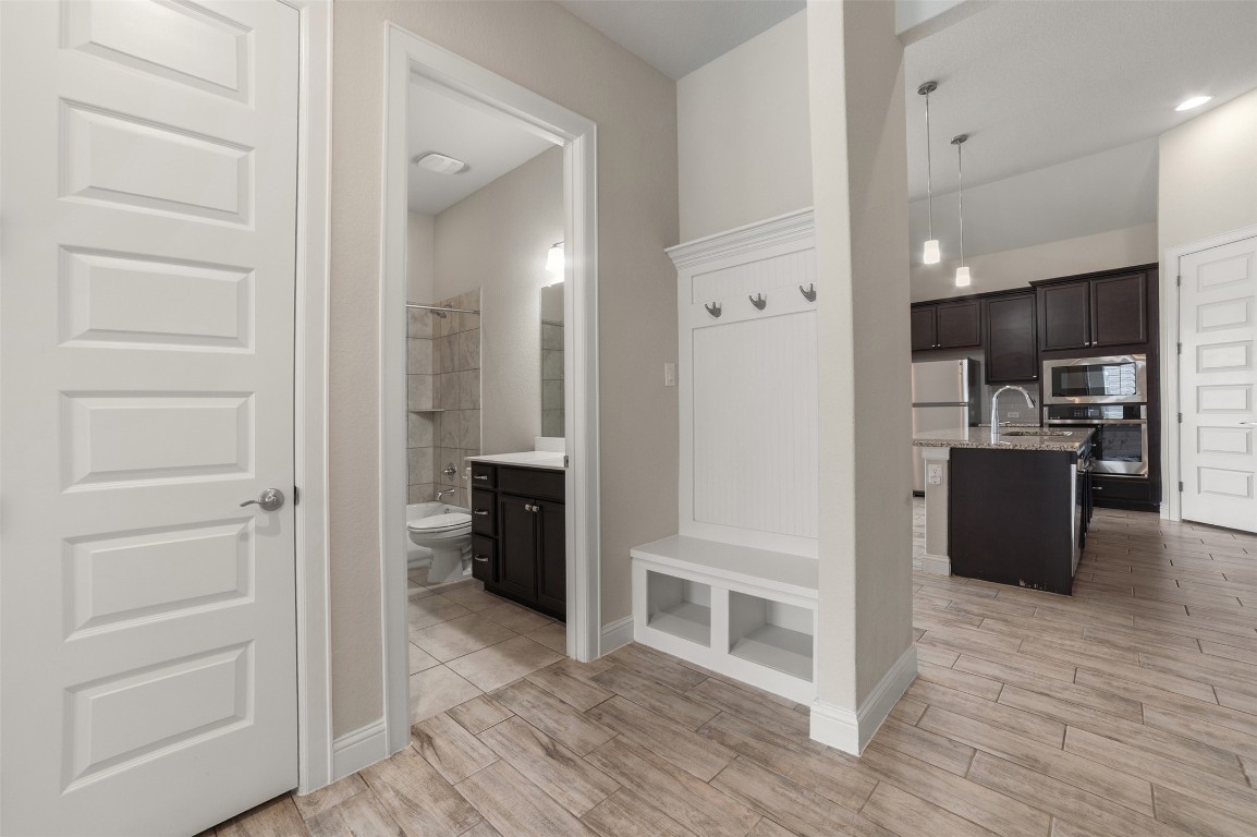 2229 Base Burner Path Leander, TX 78641 - Photo 13 of 40 a view of a kitchen with wooden floor