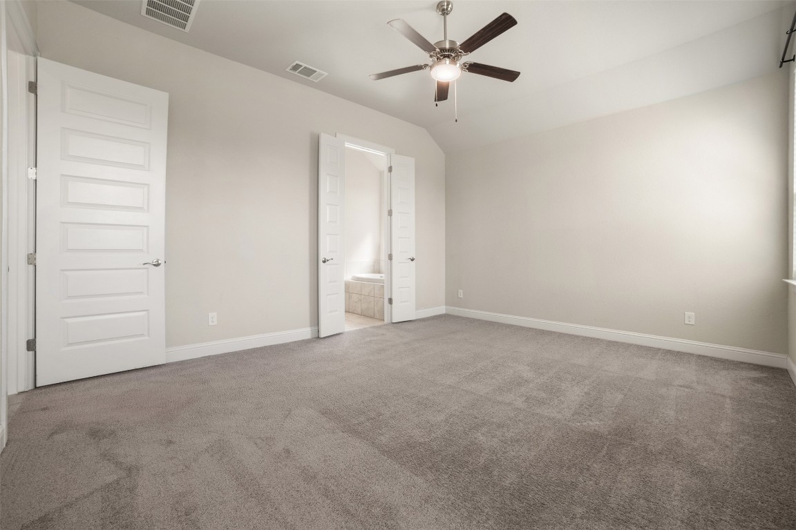 2229 Base Burner Path Leander, TX 78641 - Photo 15 of 40 an empty room with a empty space and a ceiling fan
