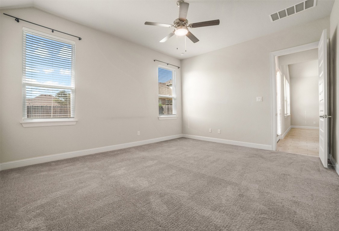 2229 Base Burner Path Leander, TX 78641 - Photo 17 of 40 a view of an empty room with a window