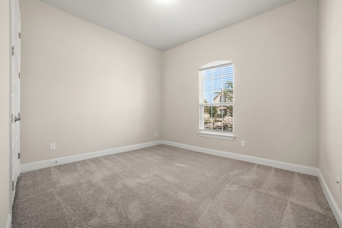 2229 Base Burner Path Leander, TX 78641 - Photo 18 of 40 an empty room with a window
