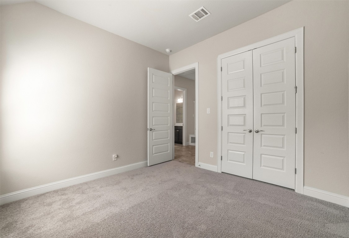 2229 Base Burner Path Leander, TX 78641 - Photo 20 of 40 an empty room with closet area