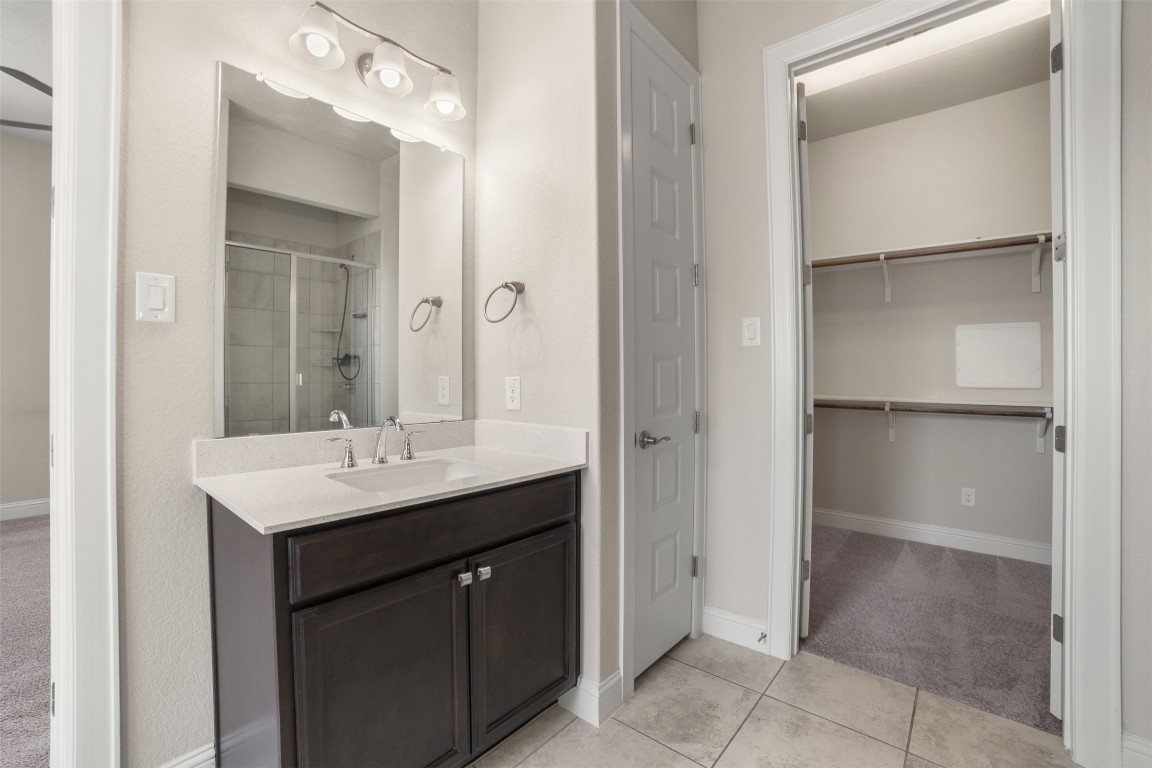 2229 Base Burner Path Leander, TX 78641 - Photo 24 of 40 a bathroom with a sink and a mirror