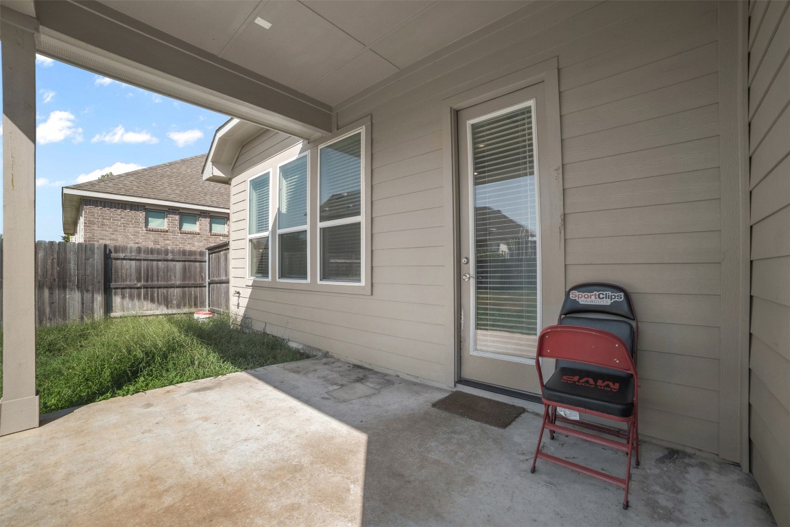 2229 Base Burner Path Leander, TX 78641 - Photo 32 of 40 a bedroom with a bed and a window