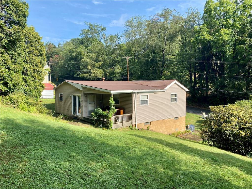 211 Amsler Road Sewickley, PA 15143 - Photo 2 of 18 a view of a house with backyard