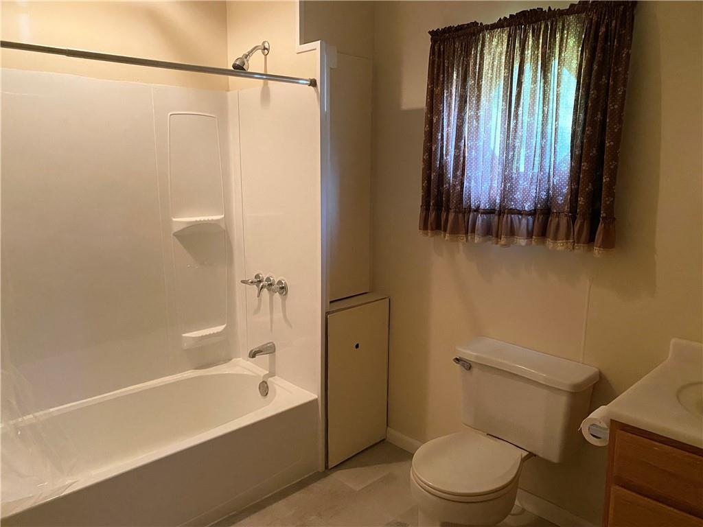 211 Amsler Road Sewickley, PA 15143 - Photo 16 of 18 a bathroom with a toilet a sink and bathtub