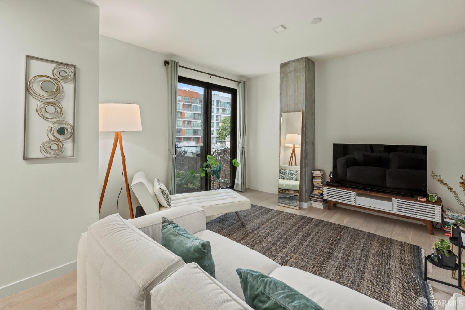 Arkansas Street San Francisco, CA 94107 - Photo 1 of 32 a living room with furniture and a flat screen tv