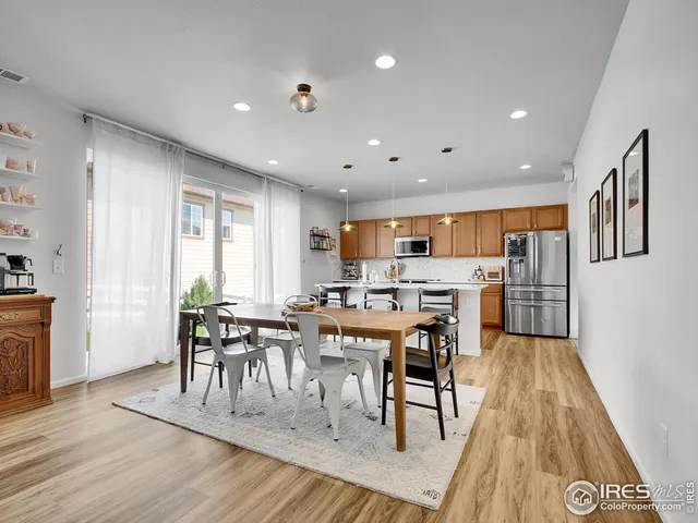 a living room with furniture fireplace and flat screen tv