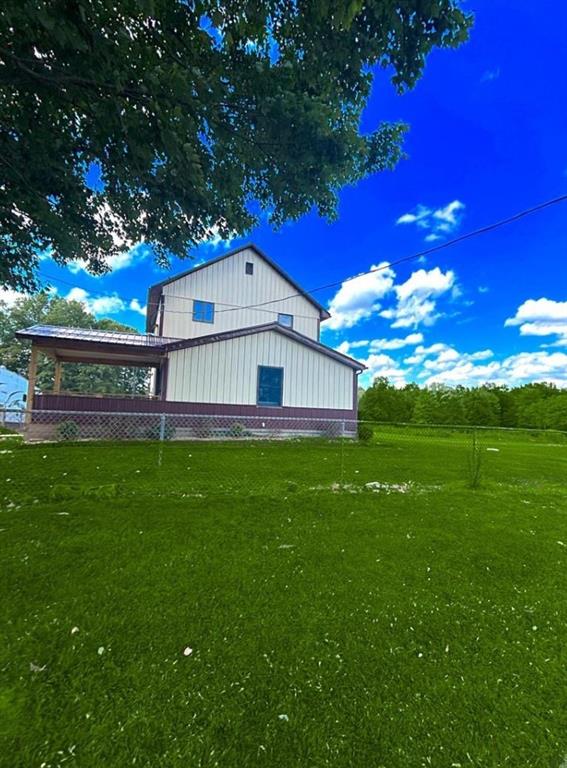 4217 Hillsville Road Pulaski, PA 16143 - Photo 3 of 21 a view of a house with a big yard