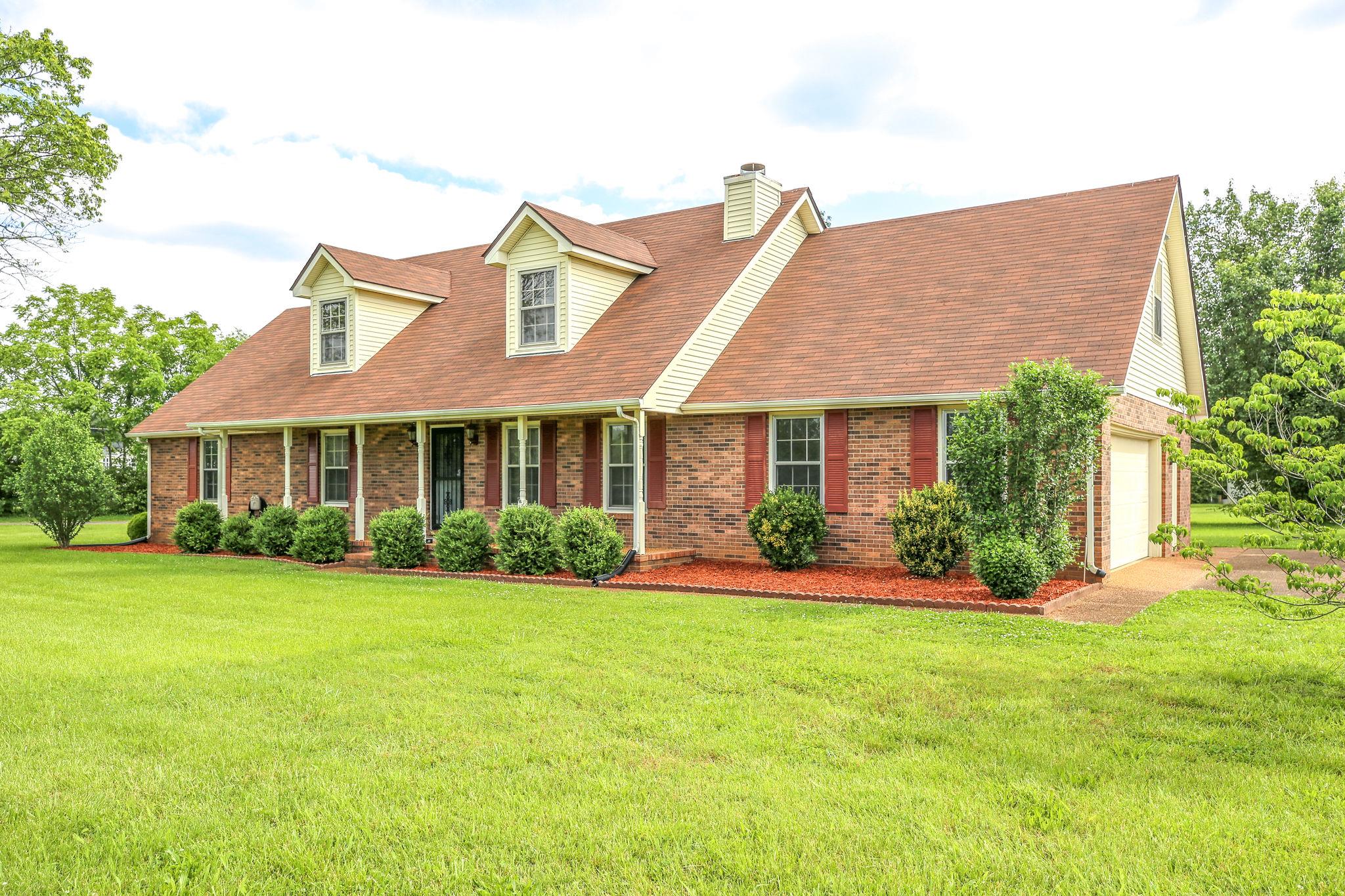 3596 Ridgefield Drive Murfreesboro, TN 37129 - Photo 2 of 24 This all brick home is situated on over 1 acre lot.
