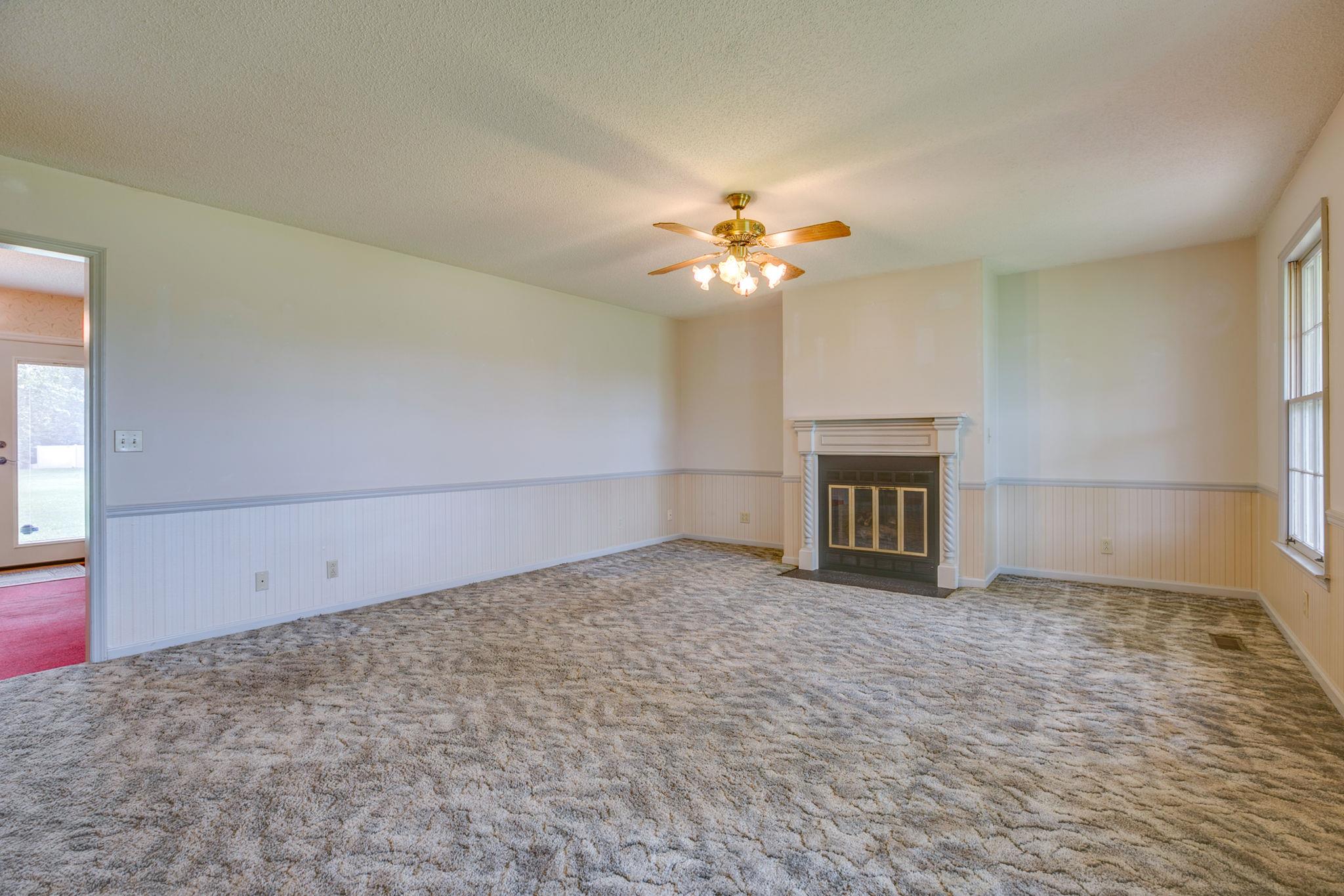 3596 Ridgefield Drive Murfreesboro, TN 37129 - Photo 4 of 24 Living room is spacious with windows outlooking the covered front porch.