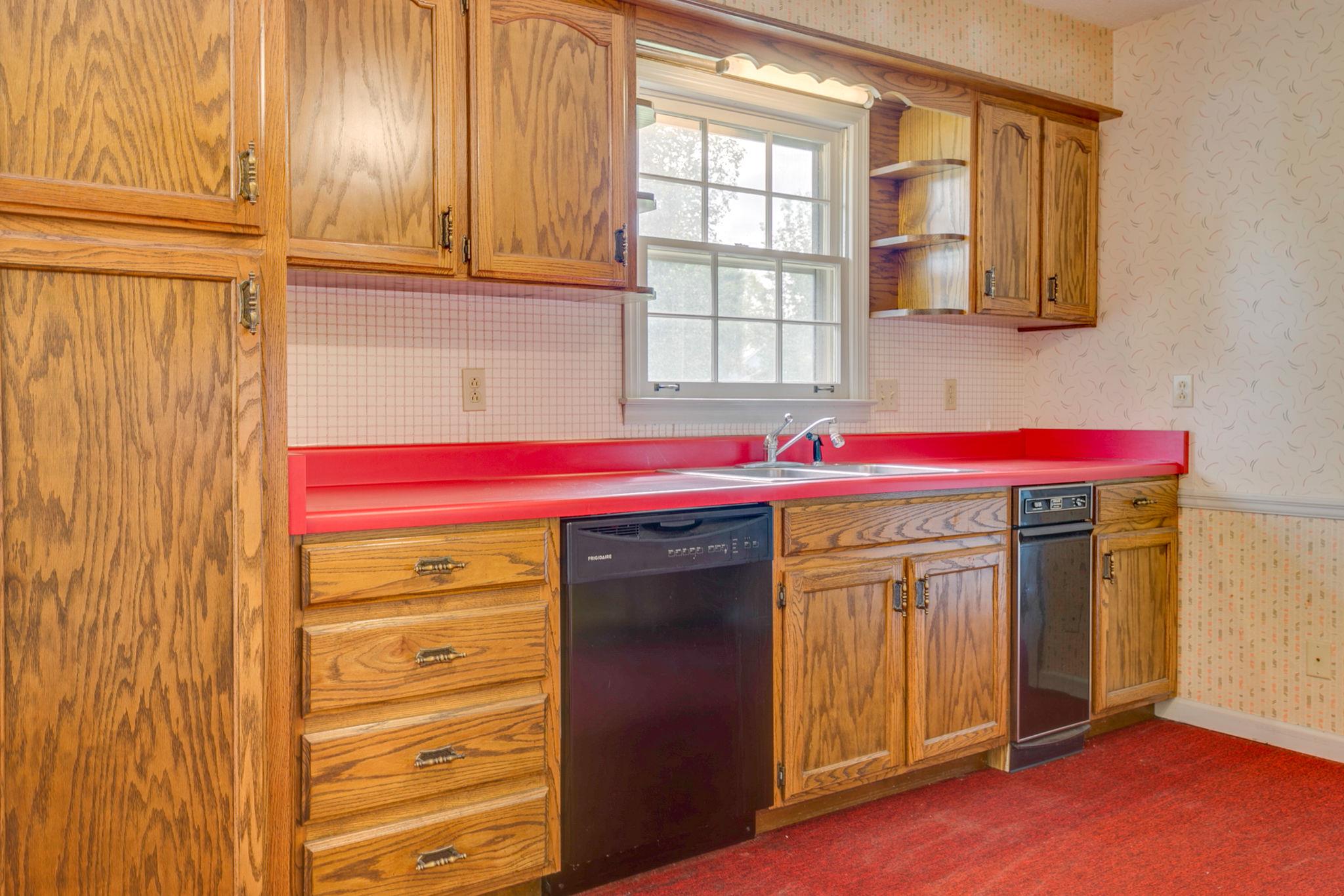 3596 Ridgefield Drive Murfreesboro, TN 37129 - Photo 9 of 24 Kitchen offers built in cabinet pantry. Generous amount of cabinets.