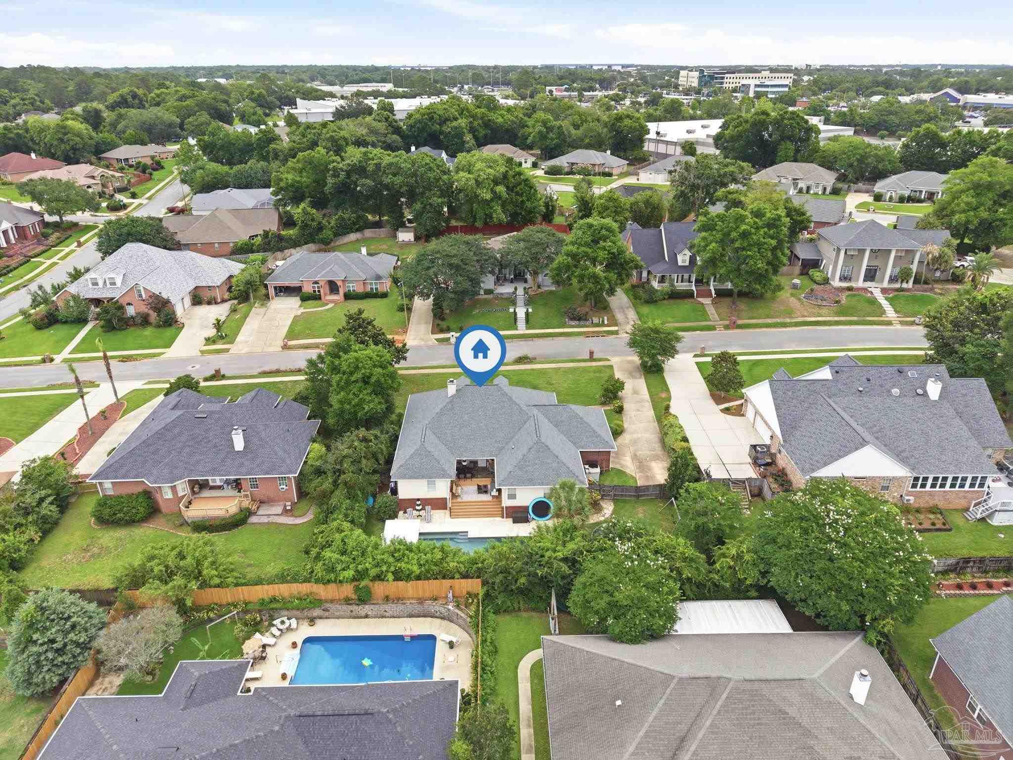 5931 Otter Point Road Pensacola, FL 32504 - Photo 54 of 67 an aerial view of a house with a garden