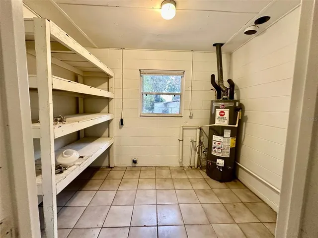 a view of a park with large trees