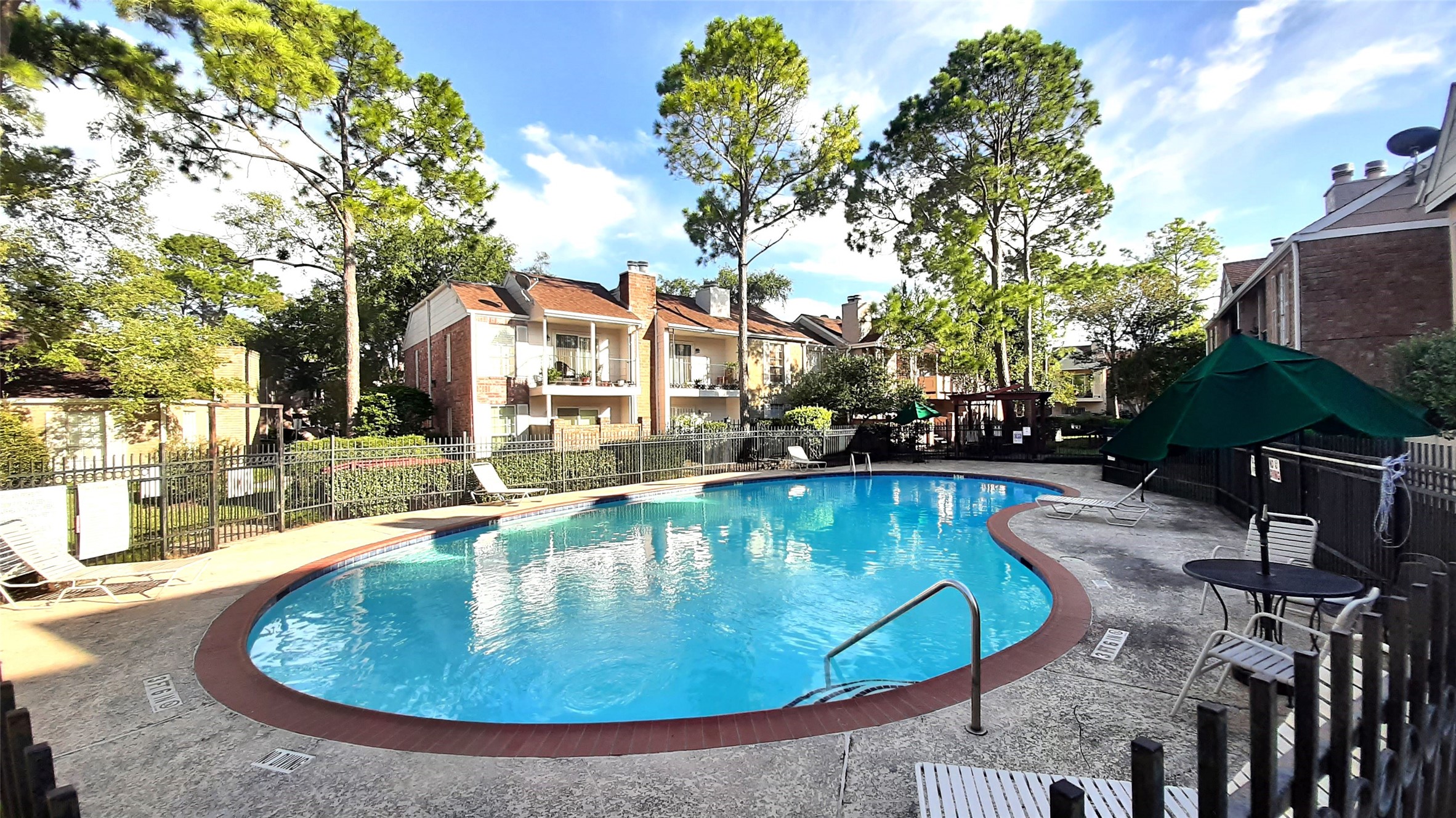 2800 Jeanetta Street, Unit 801 Houston, TX 77063 - Photo 18 of 18 a view of a swimming pool with a patio