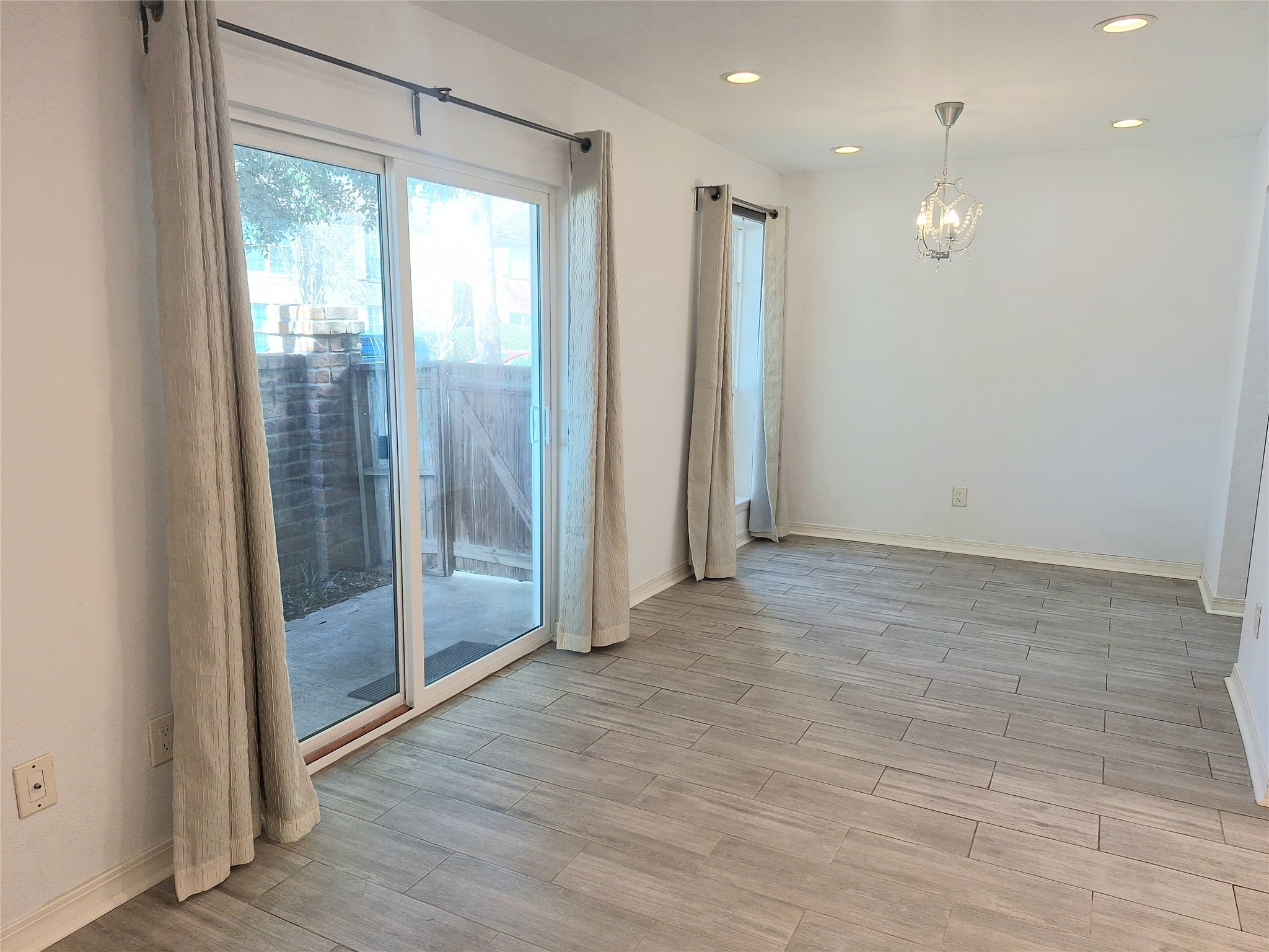 2800 Jeanetta Street, Unit 801 Houston, TX 77063 - Photo 4 of 18 a view of entryway with wooden floor